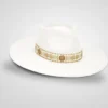 Stylish white wide-brim rancher fedora hat with a detailed gold embroidered band, ideal for sun protection.