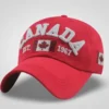 Adjustable white men's baseball cap with "CANADA" embroidery, Canadian flag detail, and "EST 1967" text.