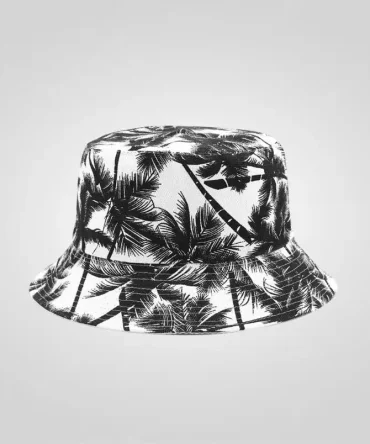 Reversible black and white palm tree print bucket hat, unisex, sun protection, outdoor cap, tropical design.