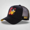 Black trucker hat with Daffy Duck patch, yellow under brim, and "DAFFY DUCK" text on mesh side.