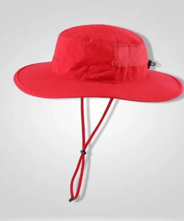 Red boonie hat with wide brim, UPF 50+ sun protection, adjustable chin strap, and mesh venting. Ideal for fishing, hiking, and gardening.
