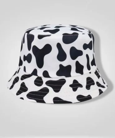 black and white cow print bucket hat, unisex fashion accessory, spotted pattern headwear, casual summer hat, bucket hat for sun protection