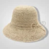 light beige raffia straw sun hat with woven texture and subtle side bow detail