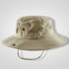 "Tan wide-brimmed boonie hat with adjustable chin strap, ideal for fishing, hiking, and sun protection"